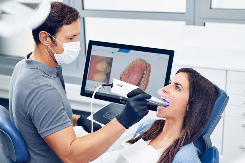 Primescan Intraoral Scanner Being Used On A Dental Patient
